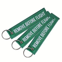 Brelok zawieszka REMOVE BEFORE FLIGHT Zielony